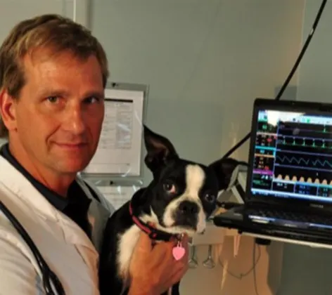 Doctor holding a dog